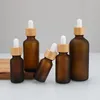 50ml Amber Round Glass Bottle with Bamboo Cap Essential Oil Dropper Bottles Mdrig