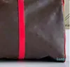 motif de fleurs marron classique sacs polochons étuis de train pochettes de voyage main
