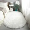 Tappeti Tappeti in pelliccia bianca Grande pelle di pecora ovale a pelo lungo Tappeto da pavimento in lana soffice e soffice camera da letto per soggiorno