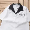 Rhude Back Big Imprimer Men Femmes Fashion Casual Fashion Shirts Shirts Pocket Pocket Embrodery Designer T-Shirts 498