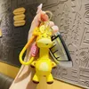 Chaveiros criativo retrátil primavera brinquedo girafa boneca chaveiro agradável nuvem limão pingente de pescoço longo veado animal chaveiro menina saco trinket