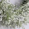 Guirlande de guirlande de gypsophile artificielle de fleurs décoratives pour les mariages de fête décoration de porte d'entrée Simulation anneau d'herbe