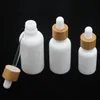 Garrafa de vidro branco opala 15ml 30ml 50ml com conta-gotas de bambu 1oz garrafas de óleo essencial de madeira porcelana teebl