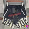 2024shorts dos homens rhude designer curto verão secagem rápida malha respirável cordão beachwear solto shorts esportivos para homem