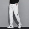 Pantaloni cargo con stampa di lettere Pantaloni da jogging Pantaloni sportivi da uomo Streetwear Pantaloni Harem sportivi Abbigliamento sportivo casual da uomo Pantaloni Harem Hip Hop Pantaloni con coulisse Capispalla in misto cotone