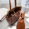 Nuevo Bolso Handlock Bolsos de hombro tipo cubo para mujer Bolsos de diseñador Cowide Cross Body Bag Desmontable Woven Letter Correa para el hombro Monedero de piel de vaca de gran capacidad