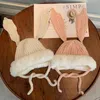 Little girls plush long rabbit ear knitting hats toddler kids hand made knitted faux fur warm beanie children thicken party cap Z5627