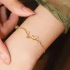 Braccialetti con ciondoli Colore oro imitazione giada per le donne Micro-intarsiato Zircone Foglia di bambù Gioielli anime Regali Pulseras Mujer all'ingrosso 2023