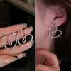 Boucles d'oreilles en forme de coeur pour femmes exquises avec conception creuse en Zircon CZ étincelant pour grandes boucles d'oreilles de mariage bijoux de température pour femmes 231128