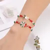 Charme Pulseiras 12 Pcs Amizade de Natal Ajustável Multicolor Trançado Pulseira Com Santa Floco De Neve Xmas Árvore Pingentes Para Meninas