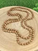 Colliers pendentif Vintage minimaliste à la mode style carré et type de tempérament long collier de perles en bois avec un style neutre 231127