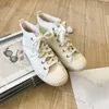 Designer casual skor kvinnor sneakers svartvita träningskor kalv läder hög kvalitet mode lyx varumärke bekväma utomhus sneakers