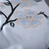 T-Shirt décontracté broderie fleur chemise haute ample 2022 nouvelle littérature fraîche et Art lanterne manches Style occidental chemise haut pour femme été
