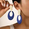 Verkoop van overdreven mode-oorbellen vrouwelijke spuitverf geometrische ovale holle oorbellen