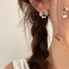 Boucles d'oreilles rétro personnalité goutte perle coquille étoile de mer conception féminine tempérament Simple et polyvalent femmes filles fête