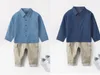 キッドボーイジャンシャツブルーカラーデザイナー男の子の男の子ファッション服服90-160 cmリトルガールズジーンズシャツ2024