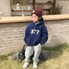 kids designer clothes fashion children's brand 2023 new autumn and winter letters hooded sweater boys padded and thickened winter models