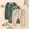 Pantaloni Confezione da 3 pantaloni da jogging per bambina e neonato in cotone attivo solido, pantaloni sportivi con coulisse casual