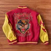 Hellstar Records Giacca Werewolf Letterman Giacca con patchwork tigrato con maniche in pelle Y2K Cappotto uniforme da baseball gotico oversize ricamato hip-hop retrò dei cartoni animati