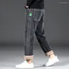 Jeans da uomo inverno 2023 caldo moda coreana pantaloni larghi ispessiti in pile pantaloni da uomo a gamba dritta marchio di abbigliamento maschile