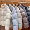 Koreańska wersja zagęszczonej opaski na dół kurtki dla kobiet krótki 2023 Nowy modny stojak na kołnierz białą kaczkę w dół męskiej kurtki