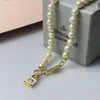 Designerin Viviene Westwoods Neue Viviennewestwood Empress Dowager Resin Lacquer Stereoscopic Lock Head Pearl Saturn Necklace Ins Ladies Beaded Chain