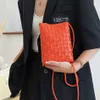 Nxy Designer Mini Borsa a tracolla da donna intrecciata Marchio di lusso Piccola borsa a tracolla in pelle Pu Tessuto Moda Maglia Telefono Portamonete 230424