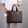 Borse a tracolla da uomo all'ingrosso in fabbrica 2 stili classici Joker borsa da uomo in pelle borsa orizzontale resistente all'usura password borsa per computer da lavoro litchi zaino moda