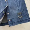 Avancerad anpassad kvinnors klänningar designer kvinnlig klänning tvättade stretch denim kjolar knappen frontknapp med diamantpärlade logotypklänningar hög midja smal wrap höft kjol