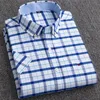 Koszule męskie S do 7xl krótkiego rękawu 100% bawełniany Oxford Soft Wygodne regularne dopasowanie Plus Size Osmijają Summer Business Men Casual Shirts 231127