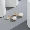 Dingle örhängen kfvanfi 2023 metall mode fjäril lady hänge korea naturlig pärla enkla kvinnliga eleganta smycken