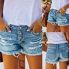 Kvinnors shorts bohemiska broderade jean kvinnor sommarskors bundet tofs denim kvinna koreansk mode frayed rip hem