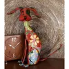 Eclectic Metal Indoor Outdoor Multi Colored Dog Sculpture with Floral Design, 12 W x 17 H