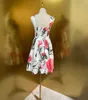 3D cup carnation print with waist cinching and slimming effect, large hem, vacation strap, pure cotton short dress