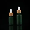 Flacone contagocce in vetro gelido 10ml 15ml 20ml 30ml 50ml con coperchio in bambù Bottiglie di olio essenziale Verde smerigliato Ncain