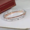 Bracciale di design Bracciale di gioielli firmati 2024New Love Bracciale a doppia catena Acciaio inossidabile di alta qualità in oro 18 carati per uomini e donne Regalo di Natale Capodanno