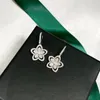 Boucles d'oreilles haute qualité classique vente 2023 tendance bijoux pour femmes Lotus flocon de neige Zircon fleurs cadeaux de mariage