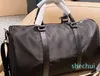 Mode Duffle-stijl Zwart Nylon TravelMens Handvatbagage Heren Dames Zakelijke bakken met schouderriem Lof