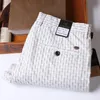 Calças de marca roupas masculinas branco inglaterra homem calças moda estiramento calças casuais negócios fino ajuste masculino calças xadrez