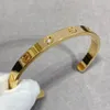 Amor Bangl Bangle One Diamond Pare Pulsel para mujer Diseñadora Apertura de oro Chapado de oro 18K T0P Reproducciones oficiales Fashion 013