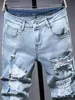 Calças masculinas rasgadas jeans outono designer fino ajuste preto azul denim calças jeans angustiado calças destruídas l231129