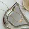 Delikat Petite Sideway Cross Halsband Pendant Kvinnor Rostfritt stål Thin Chain Link Christian Jewelry346e