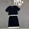 Tweedelige jurk designer M Family 23 zomer nieuwe slanke en dunne stijl kant-up korte mouwen + hoge taille rand halve rok set 1VZR