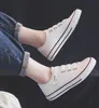 Scarpe di tela bianche nere Scarpe vulcanizzate da donna autunnali Moda velcro calbe tie Scarpe da passeggio casual basse Tenis De Hombre traspiranti