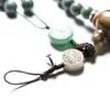 Strand Weathered Leather Green Bodhi Root Mobile Phone Pendant Hanging Neck Rope Femmes Hommes Rétro Cadeau Amovible Pour Prévenir La Perte