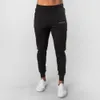 Pantalones de hombre Muscle Fitness Running entrenamientos deportivos pantalones de algodón transpirables para hombre Slim Beam Mouth Casual pantalones de salud 231129