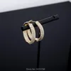 Hoop kolczyki Huggie 29 mm złoto plisowane luz
