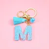 Keychains Fashion Blue Tassel A-Z Letters Initiële hars sleutelhangers ringen handtas hanger schattige auto sleutelen charme tas accessoireskeychains