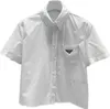 2023 Nuova maglietta da donna di alta qualità Famiglia Estate Semplice tasca a triangolo Camicia bianca Casual Versatile Top
