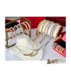 Armband Halskette Marke Modeschmuck Set für Frauen vergoldet Rive Steam Punk Party Clash Design Ohrringe Ri Drop Delivery Sets Dhmg2